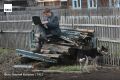 #архив_ТАСС_Сибирь. 30 сентября отмечается День рождения Рунета На фото — житель села работает на ноутбуке у своего дома